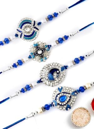 Dreamica Rakhi for Brother, Set of 4 Designer Rakhi with Roli Chawal Pack And Greeting Card | Pack Of (3 Rakhi, Greeting Card And Roli Chawal Pack) GP-828