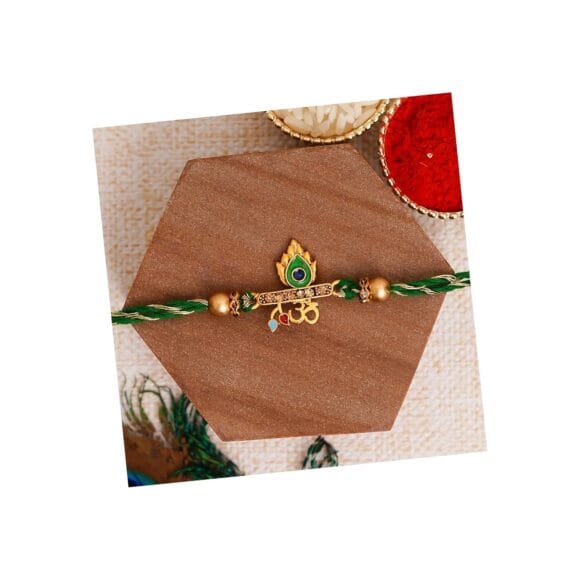 eCraftIndia Green & Golden Om & Peacock Feather Religious Designer Rakhi with Roli Chawal Pack - Rakhi for Brother, Bhaiya, Bhai